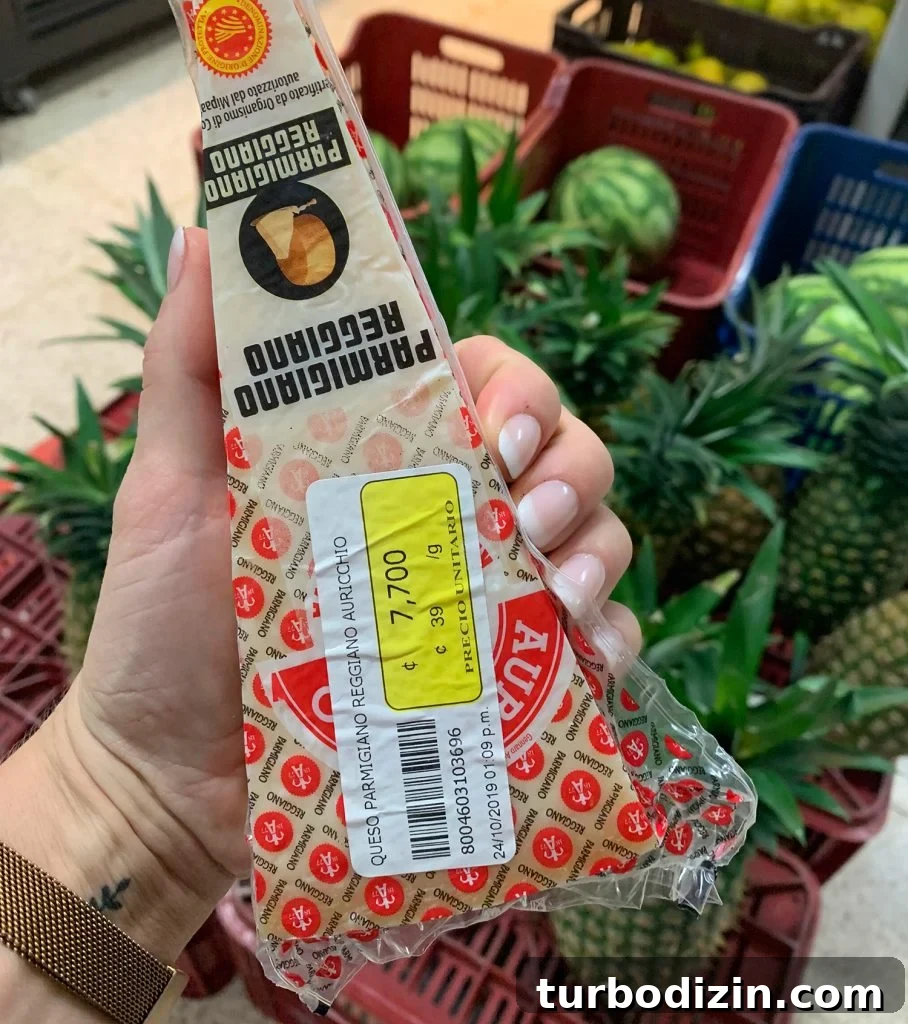 Slice Of Cheese With Price Tag In Costa Rican Colones