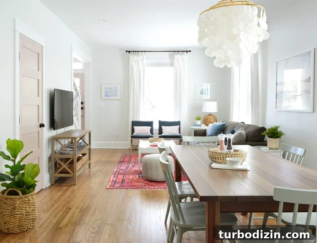 Duplex kitchen with dining table and capiz chandelier