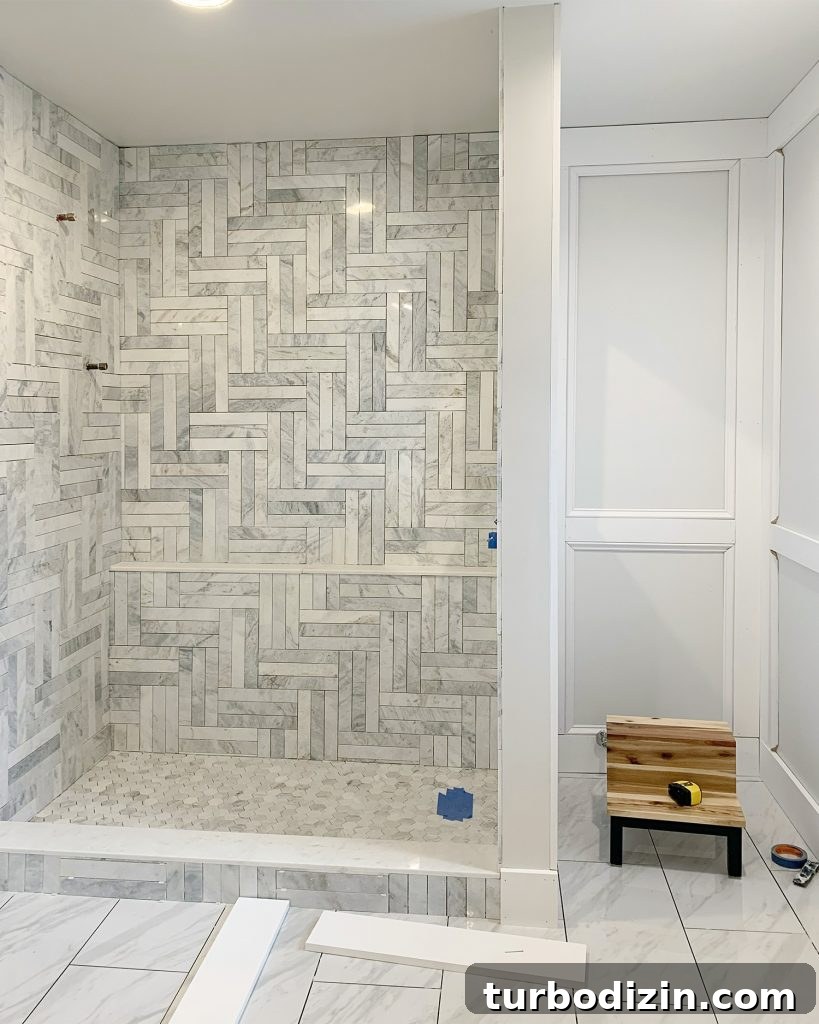 How to Install Decorative Wall Molding for a Polished Look 9 Unpainted Decorative Wall Molding In Master Bathroom With Tiled Marble Shower