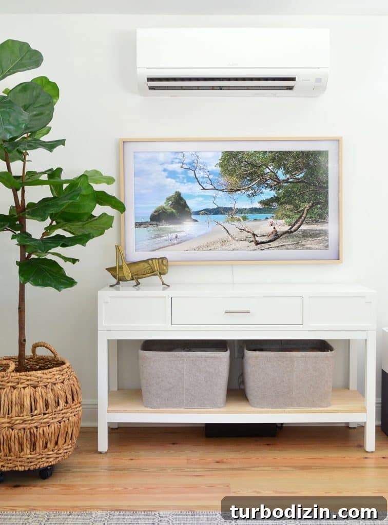 Our Upstairs Family Room After Four Weeks: What Changed and Why 10 Samsung Frame TV Under Mini Split With Faux Fig Tree