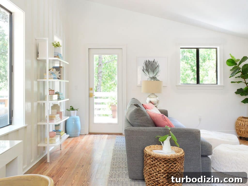Our Upstairs Family Room After Four Weeks: What Changed and Why 11 Beachy Living Area With Walkway Behind Couch To Upstairs Deck