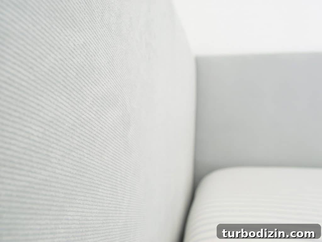 Simple DIY Headboard Ideas to Build Yourself in a Weekend 16 Fabric detail on DIY upholstered headboard with subtle blue ribbing