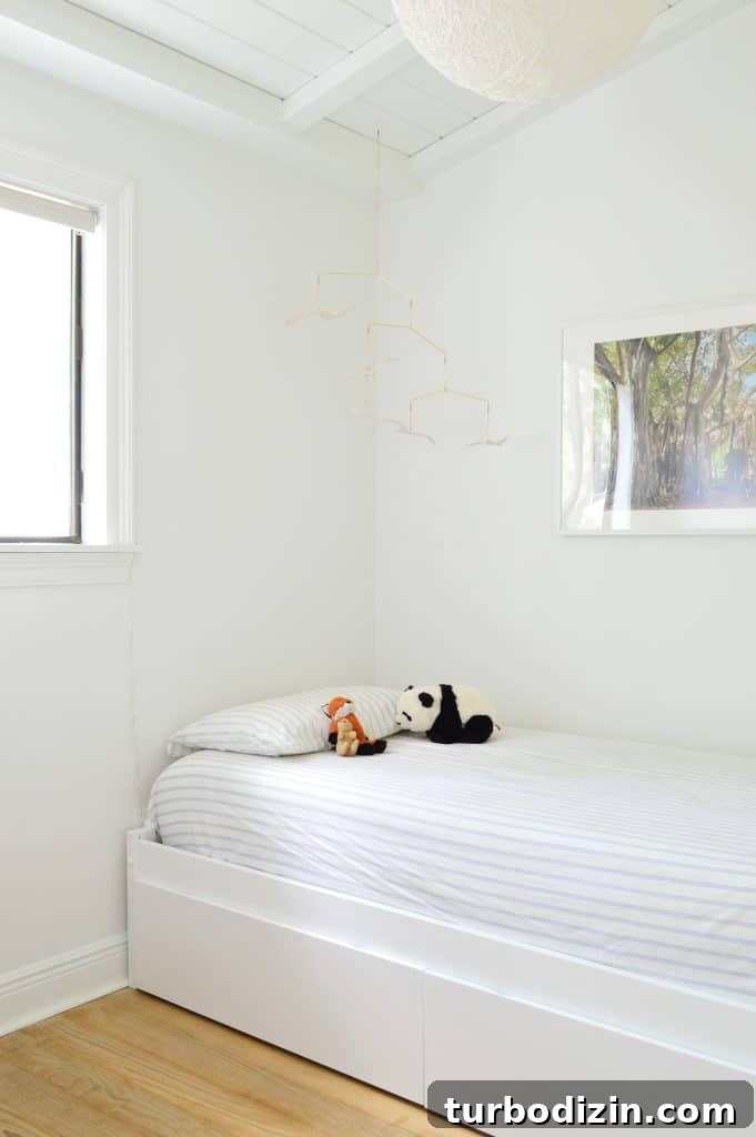 Simple DIY Headboard Ideas to Build Yourself in a Weekend 3 Before photo of boys bedroom with daybed and blank walls