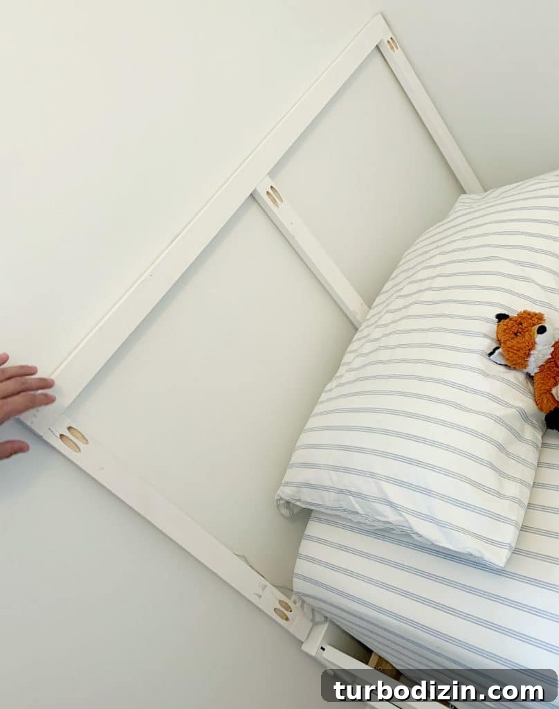 Simple DIY Headboard Ideas to Build Yourself in a Weekend 5 Test fitting frame constructed for DIY headboard before attaching fabric