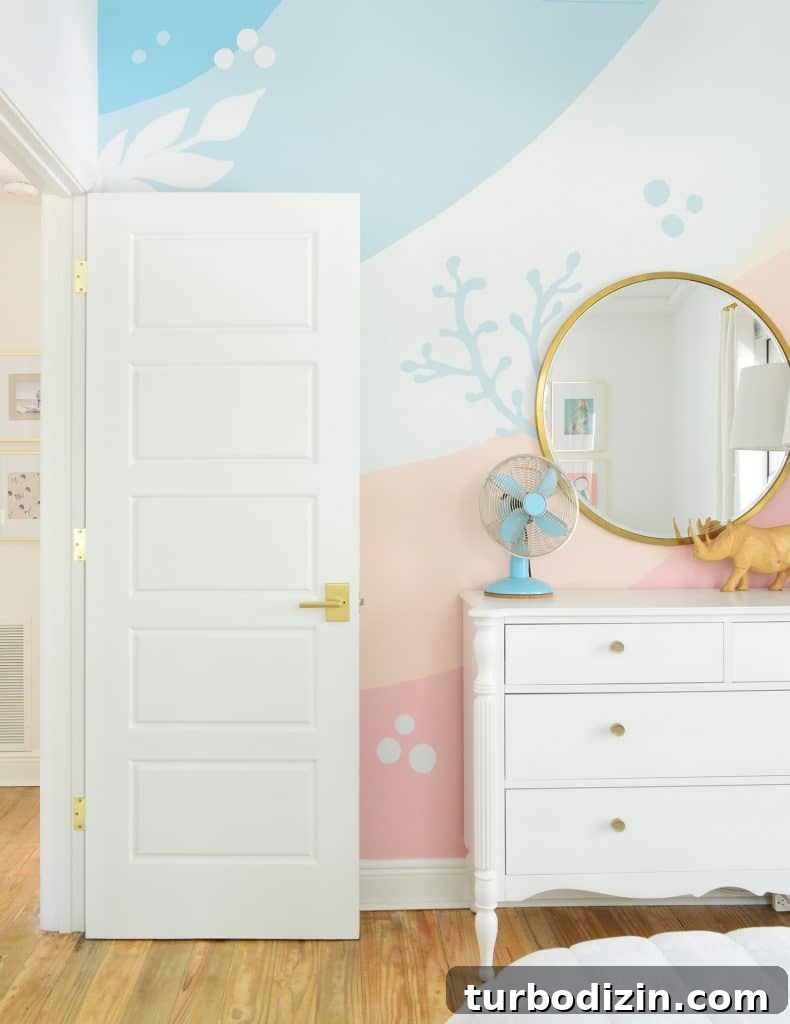 How to Paint a DIY Wall Mural: Step-by-Step Guide for Home Walls 16 Beachy abstract mural with ocean themed elements paintedon wavy stripes