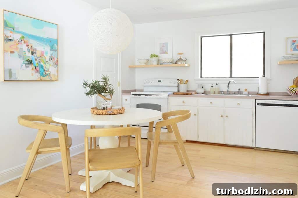 5 Quick Kitchen Updates to Transform Your Space 6 MInimal Kitchen With New Woven Globe Pendant From Pottery Barn Teen