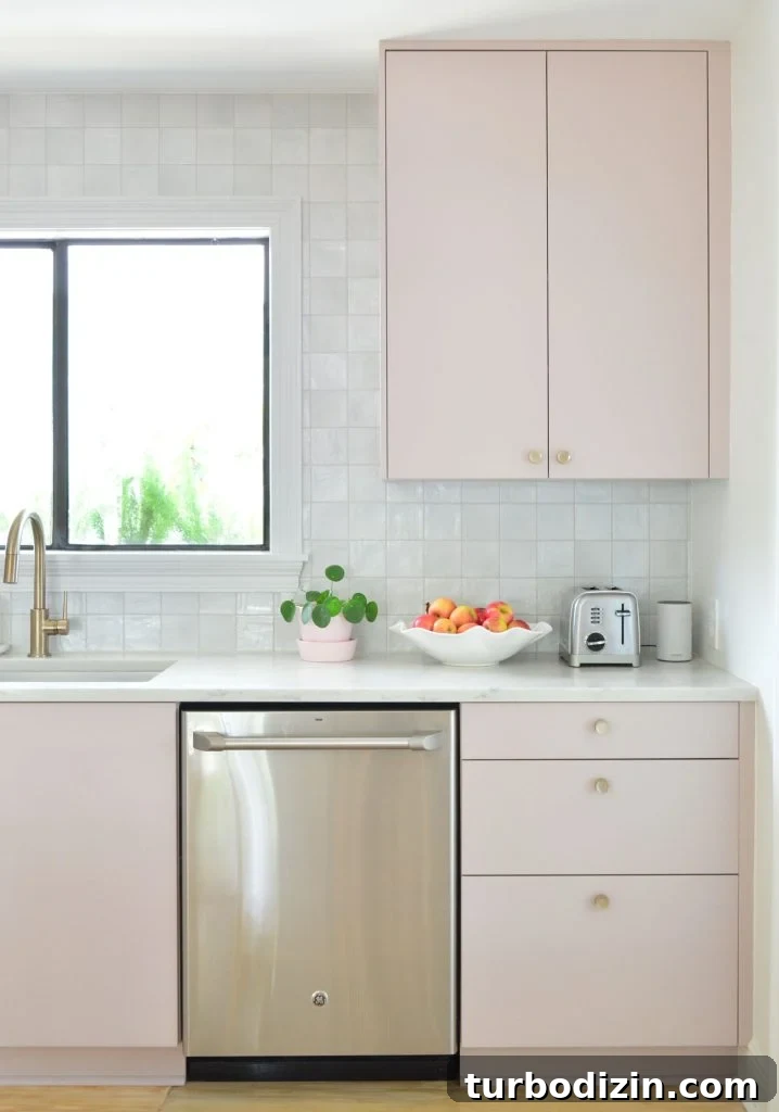 How We Painted Our Kitchen Cabinets Pink: A Room-by-Room Reveal 22 Upper Cabinet In Painted Ikea Kitchen With Gray Backsplash
