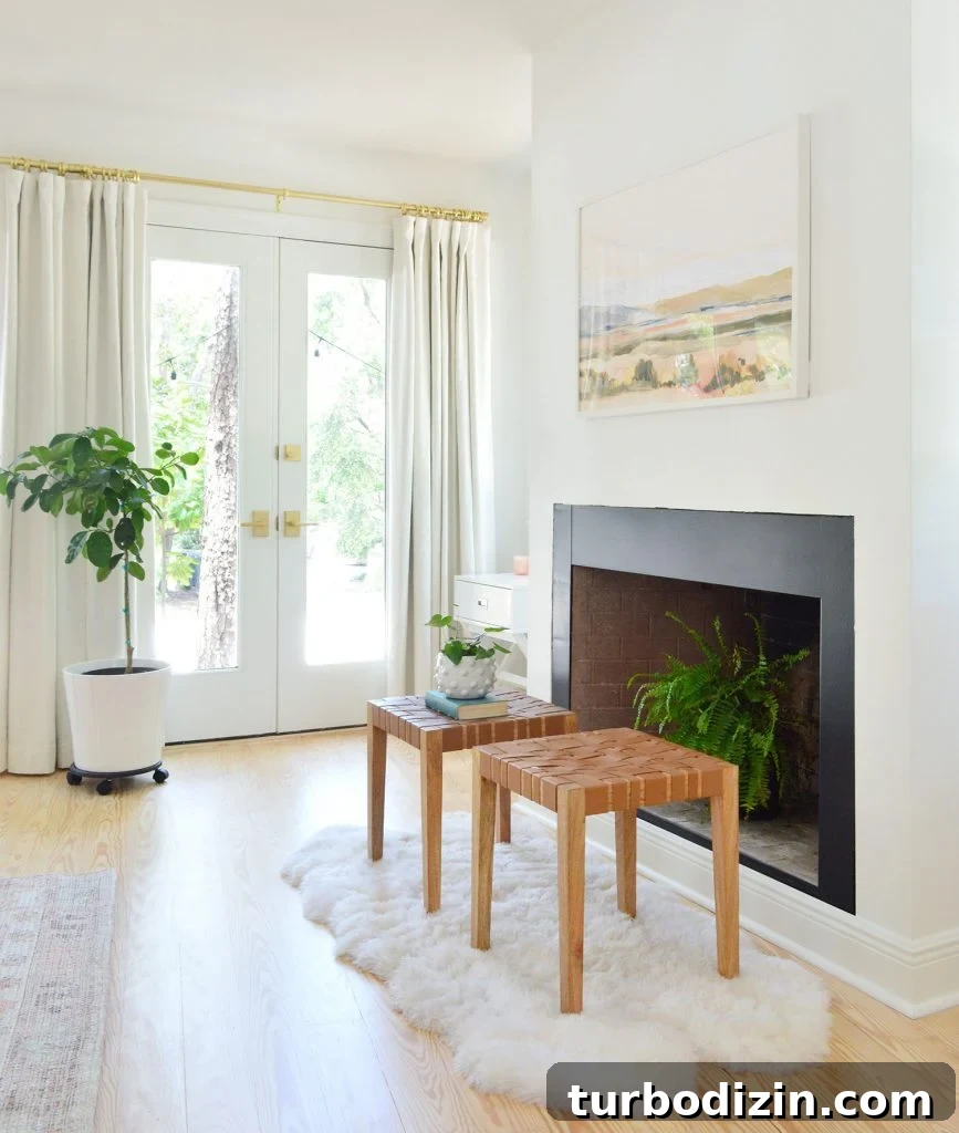 How to Build a Selenite Crystal Fireplace for Your Home 6 Bedroom fireplace with black border and fern in firebox