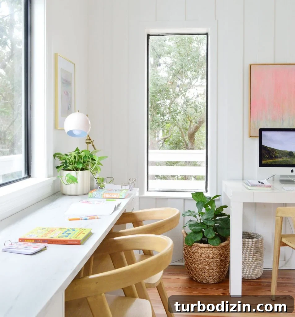 How We Hung a Massive Serena & Lily Chandelier in Our Home 14 Kids Art Desk Under Window With Computer Workstation In Background