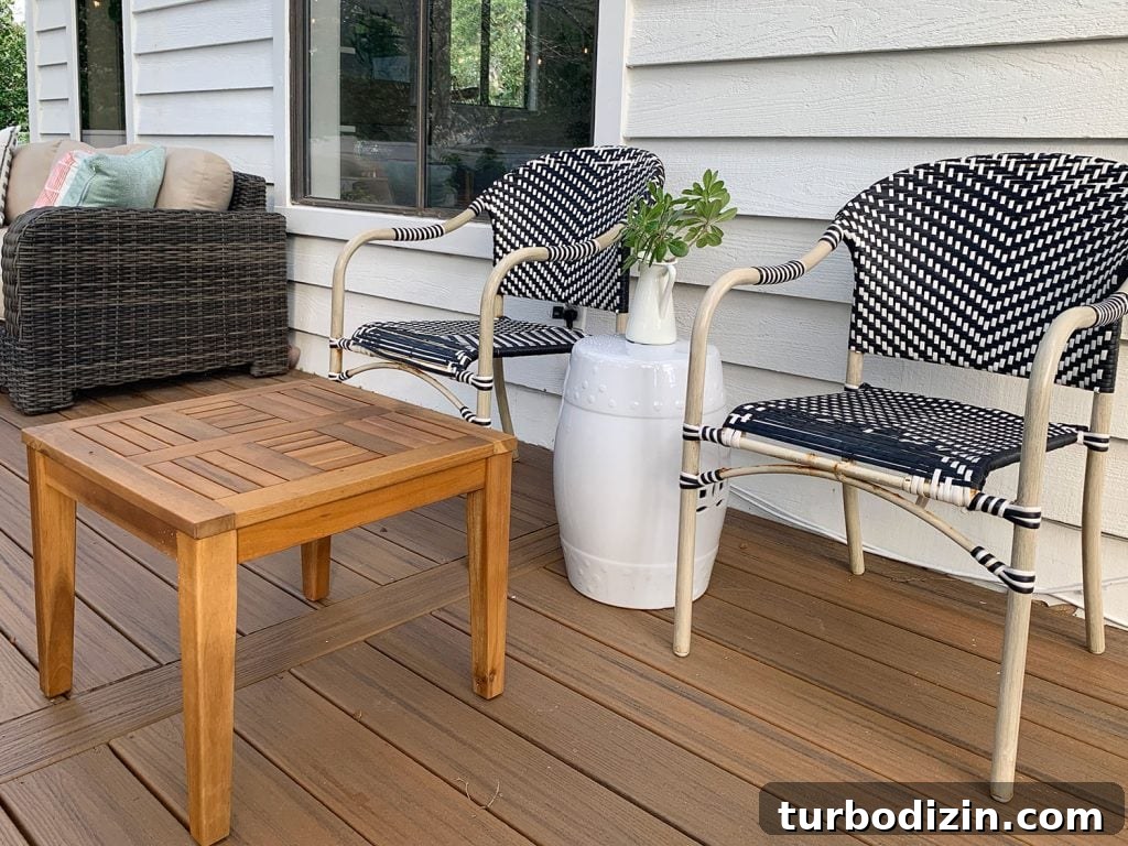Black And White Woven Outdoor Chairs With Bits Of Rust