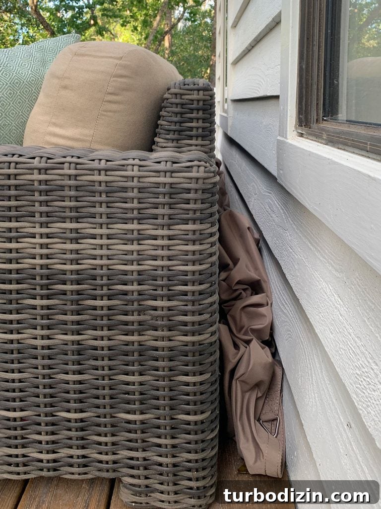 Sun Shade Cover Stuffed Behind Outdoor Sofa