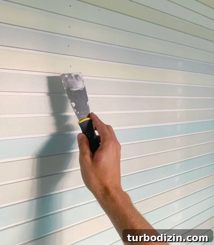 How to Create a Colorful Wood Accent Wall: DIY Guide 16 Hand Spackling Nail Holes On Striped Wall Treatment