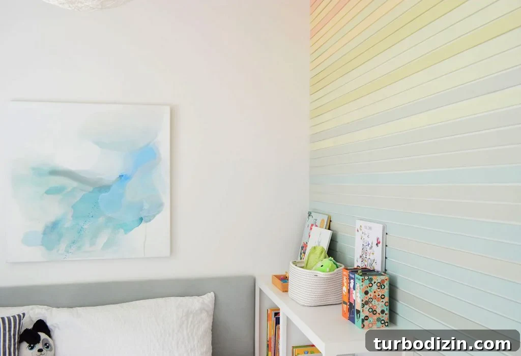 How to Create a Colorful Wood Accent Wall: DIY Guide 21 Abstract Blue Painting Next To Rainbow Stripe Wall Treatment