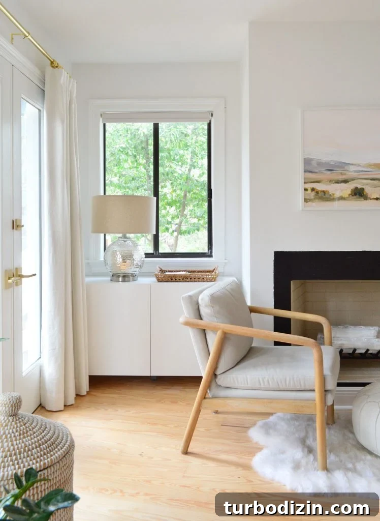 Ikea Besta Cabinet Under Window In Bedroom With Lamp On It