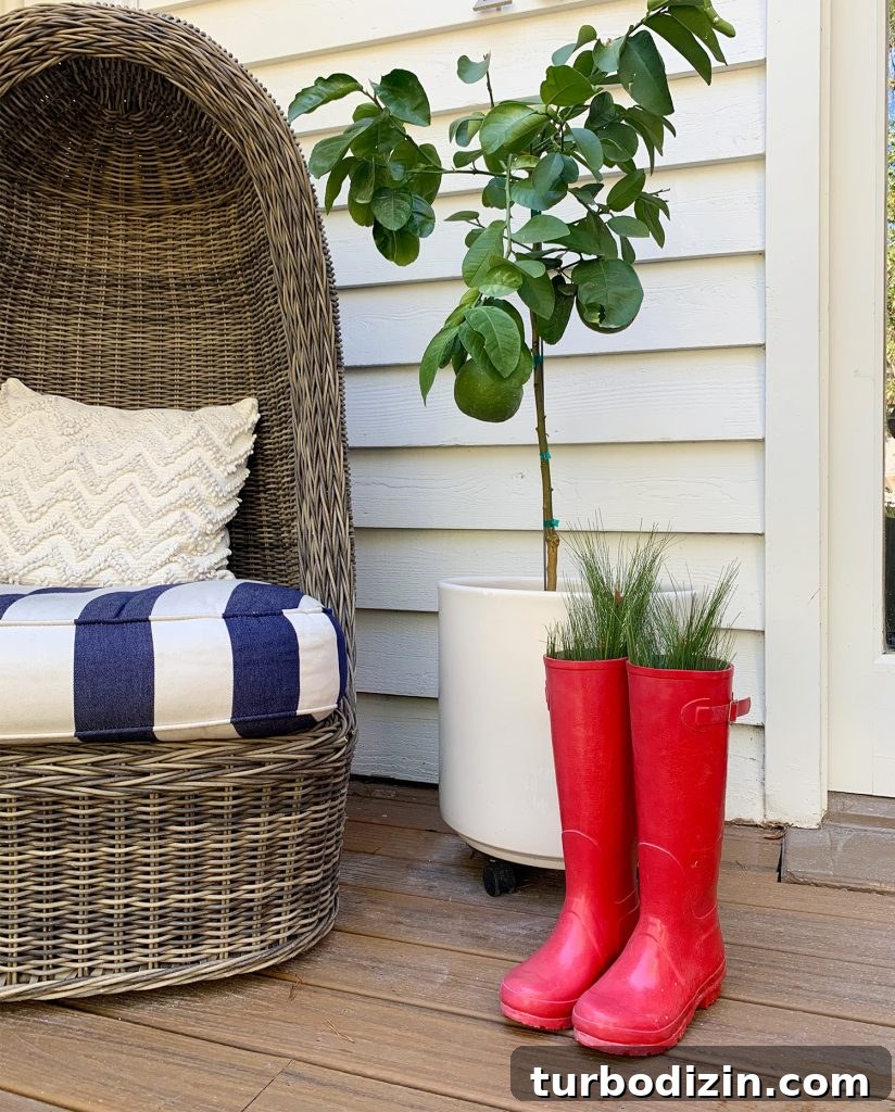 Holiday Decorating Ideas for Our Cozy Downsized Home 13 Red Boots With Holiday Greenery On Front Porch