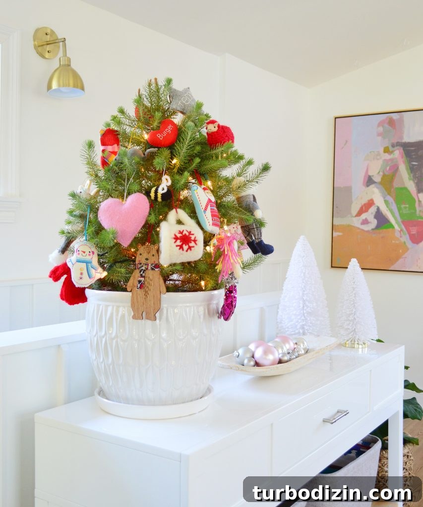 Holiday Decorating Ideas for Our Cozy Downsized Home 3 Small Tabletop Tree In White Pot With Colorful Ornaments