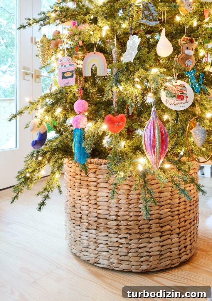 Holiday Decorating Ideas for Our Cozy Downsized Home 7 Woven Basket At Base Of Christmas Tree With Colorful Ornaments