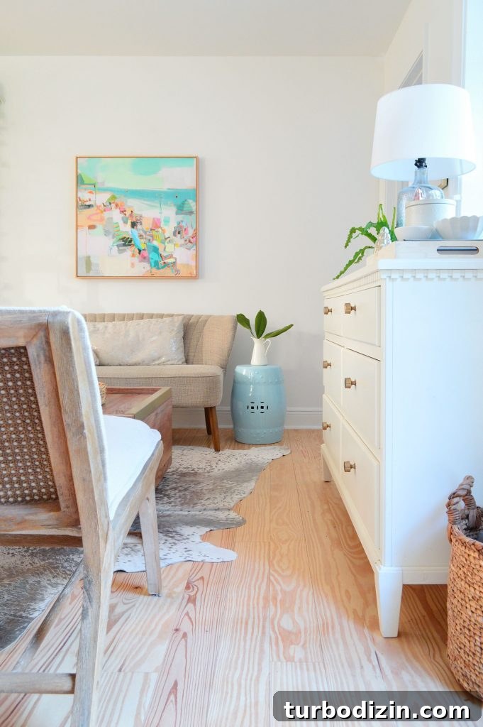 Our Kitchen and Sitting Area: Six Months of Living In 12 Space between entry dresser and seating area chairs