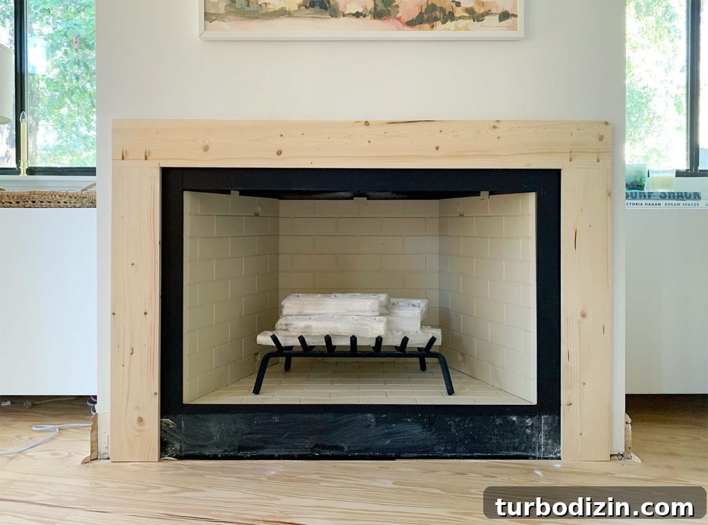 Modern Fireplace Mantel Ideas: Step-by-Step Build Guide 13 Mantel Brace Piece Made Of Raw Wood Surrounding Fireplace On 3 Sides