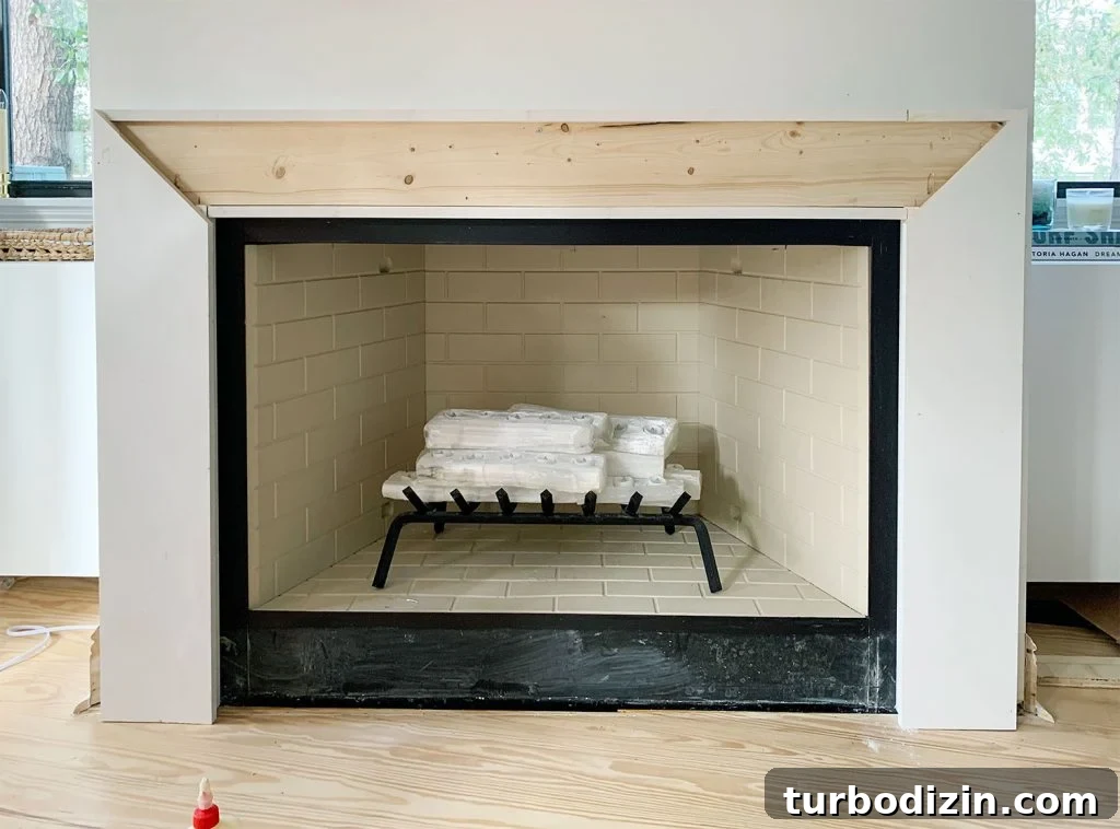 Modern Fireplace Mantel Ideas: Step-by-Step Build Guide 15 Thick White Boards Added To Both Sides Of Brace Piece With Angled Miter Cuts At Top
