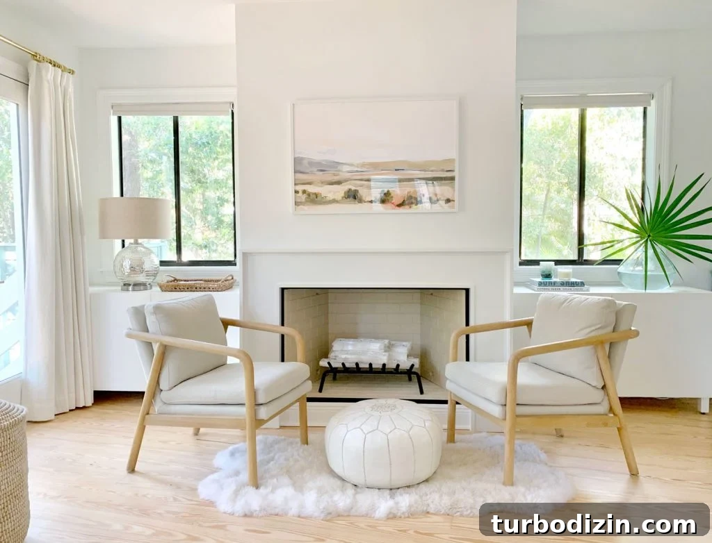 Modern Fireplace Mantel Ideas: Step-by-Step Build Guide 23 Finished fireplace scene without Christmas decor just chairs and sheepskin rug