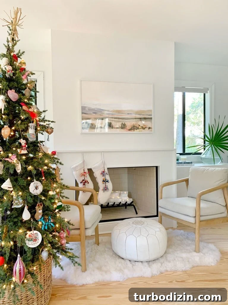 Modern Fireplace Mantel Ideas: Step-by-Step Build Guide 22 Christmas tree next to seating area in front of finished modern fireplace