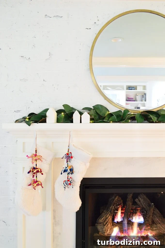 Modern Fireplace Mantel Ideas: Step-by-Step Build Guide 8 Detail of white traditional fireplace surround with stockings and garland