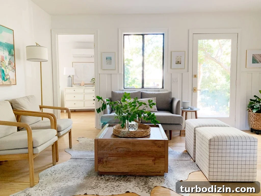 Small Loveseat Ideas for a Cozy Sitting Room 2 Sitting area including wood coffee table two plaid ottomans two arm chairs and gray loveseat