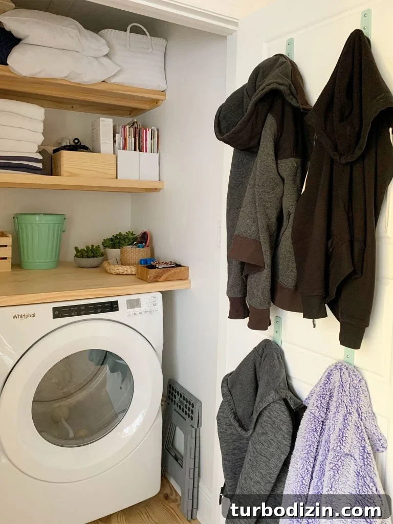 Small Loveseat Ideas for a Cozy Sitting Room 11 Coats hung on back of laundry closet door