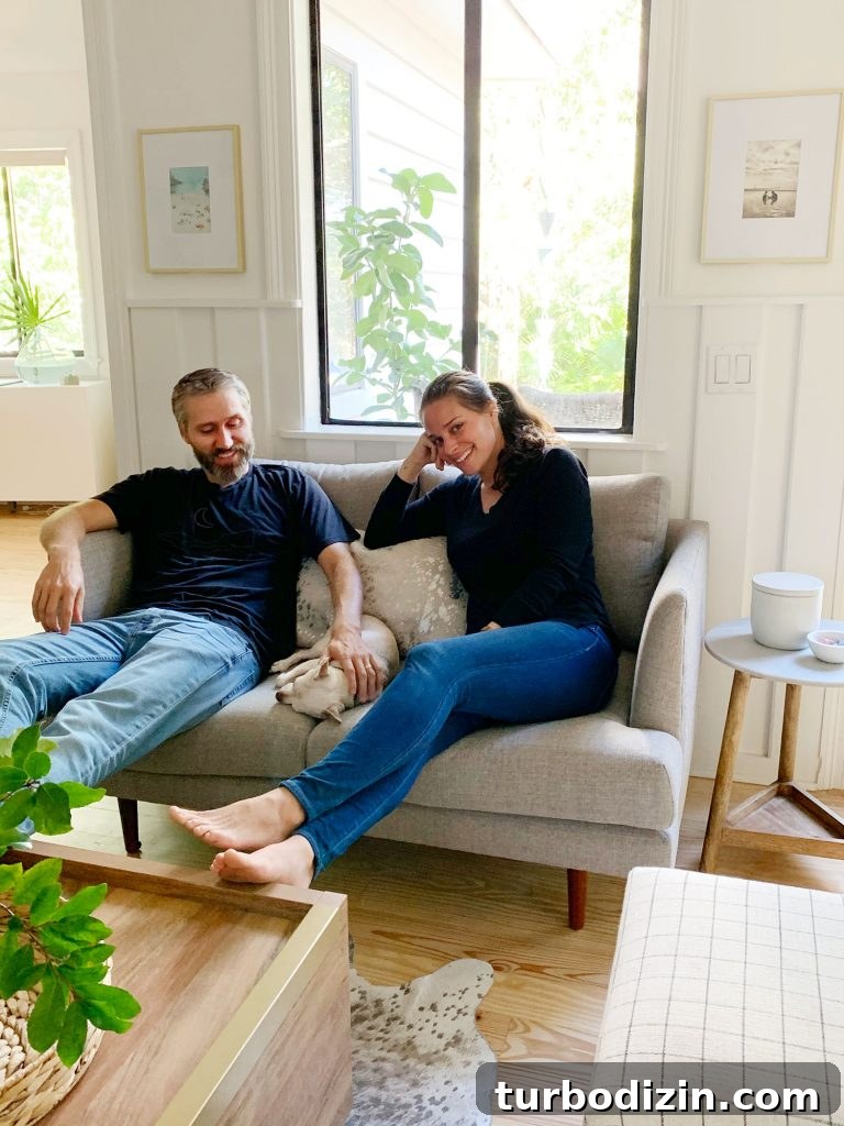 Small Loveseat Ideas for a Cozy Sitting Room 17 John and Sherry sitting with chihuahua on gray loveseat together