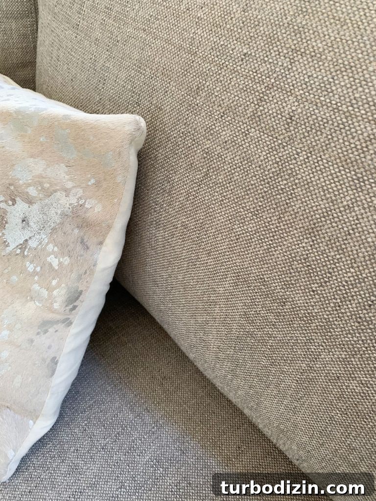 Small Loveseat Ideas for a Cozy Sitting Room 19 Detail of gray fabric on loveseat