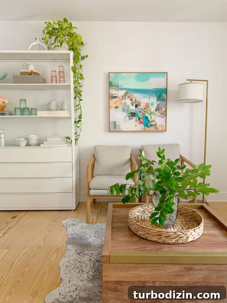 Small Loveseat Ideas for a Cozy Sitting Room 20 Side view of sitting area with plants on coffee table and hanging from kitchen shelf