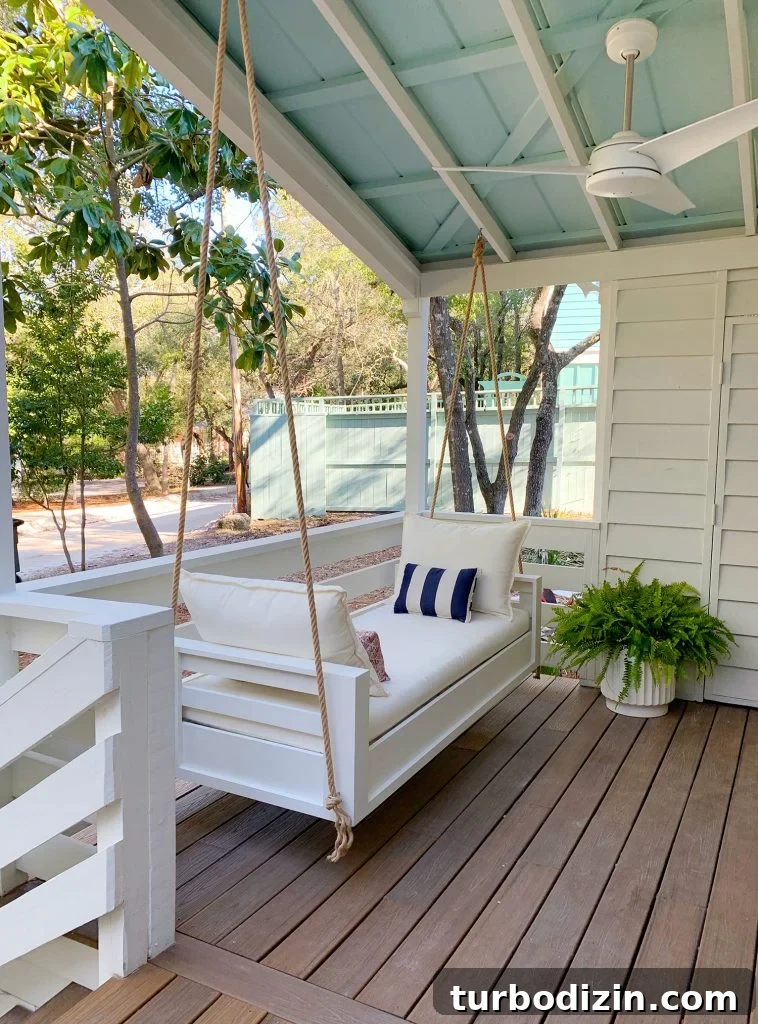 How to Build a Hanging Daybed: Step-by-Step Guide for Your Patio 16 Angled View Of Finished Outdoor Hanging Daybed With White Cushions
