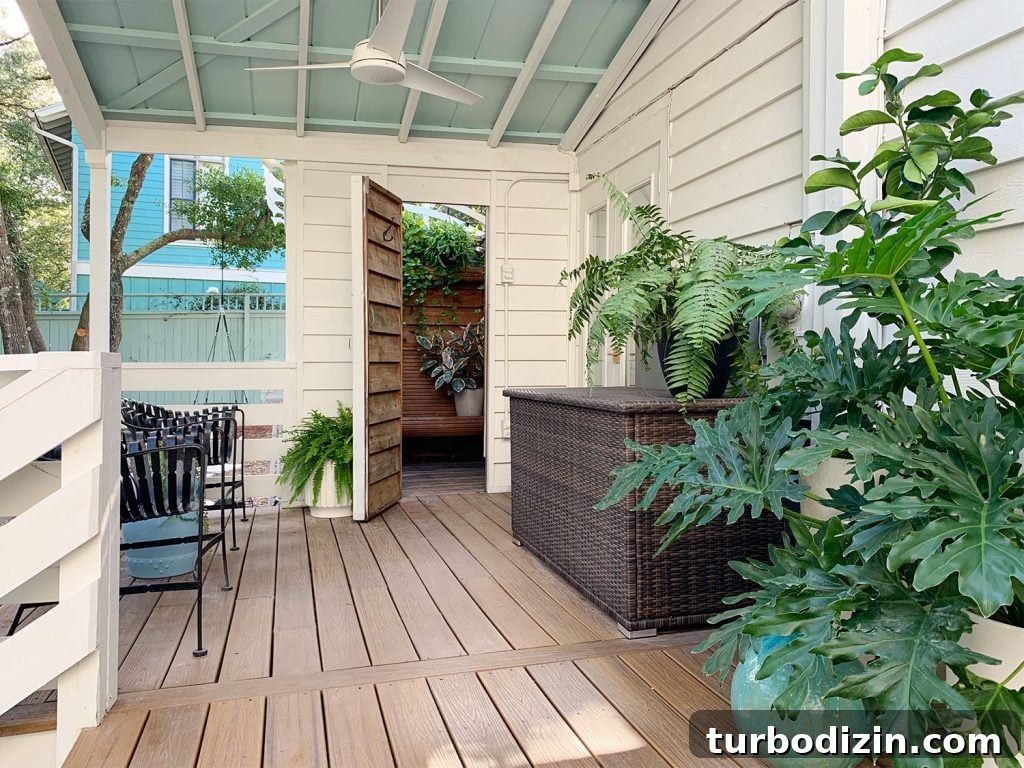 How to Build a Hanging Daybed: Step-by-Step Guide for Your Patio 6 Covered Porch With Blue Ceiling And Open Door To Outdoor Shower