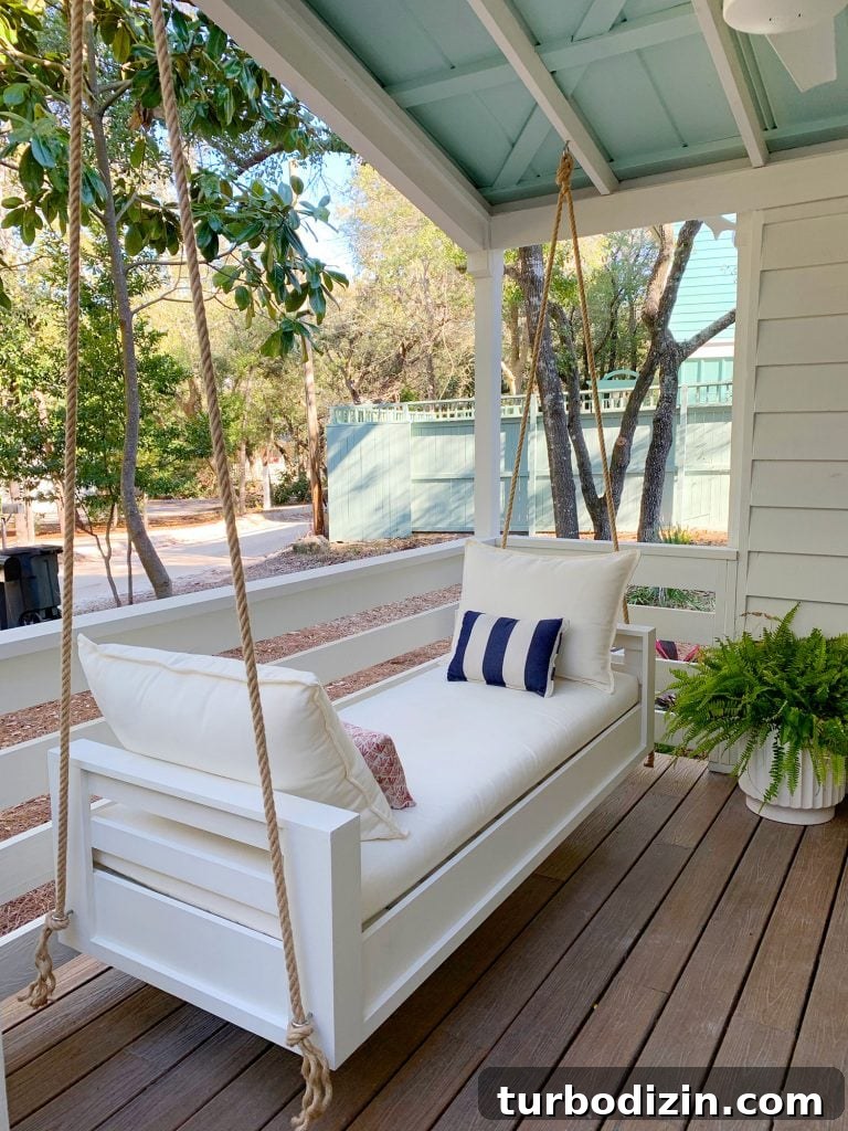 How to Build a Hanging Daybed: Step-by-Step Guide for Your Patio 8 Angled View Of Finished Outdoor Hanging Daybed With White Cushions