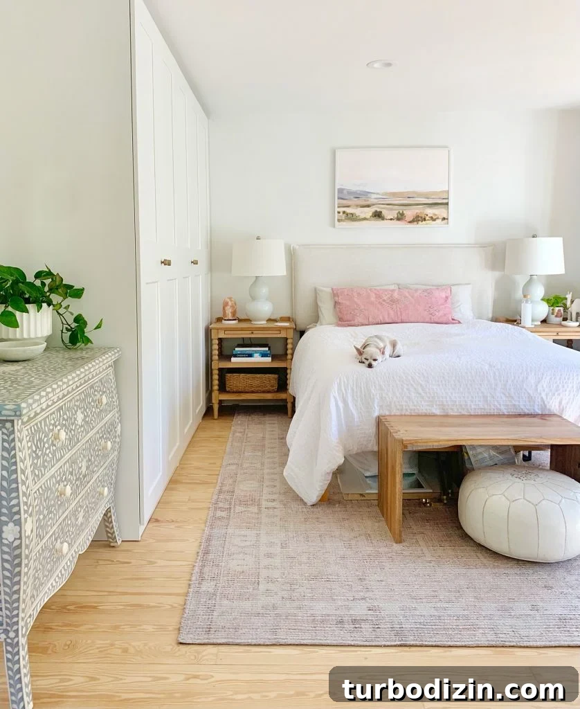 Turn Ikea PAX Wardrobes Into a Custom Closet System 5 Bed next to wall of Ikea Pax wardrobes