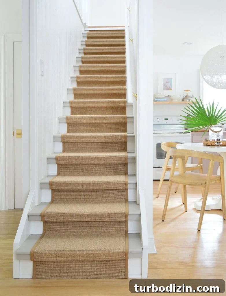 Before and After Home Photos: 14 Months of Renovation Progress 12 Finish Sisal Stair Runner On Staircase With Kitchen In Background