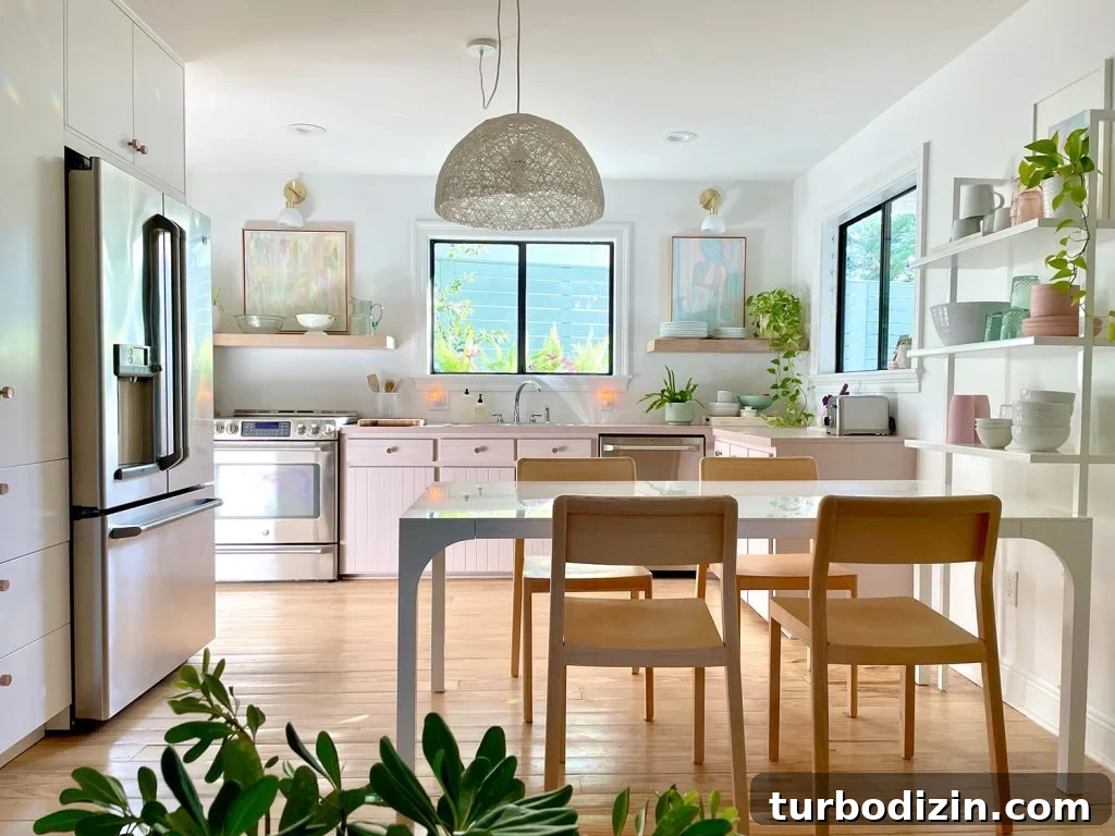 9 Smart Small Kitchen Ideas to Maximize Space and Style 2 Closer View Of Beachy Kitchen From Sitting Area With Dining Table And Built In Pantry