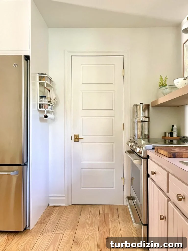 7 Stylish Storage Furniture Pieces for Small Spaces 16 White Door To Kitchen Utility Closet With Spice Rack On Pantry Side