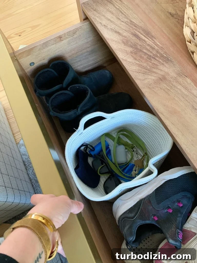 7 Stylish Storage Furniture Pieces for Small Spaces 4 Drawer Open In Storage Coffee Table Filled With Shoes Dog Leash