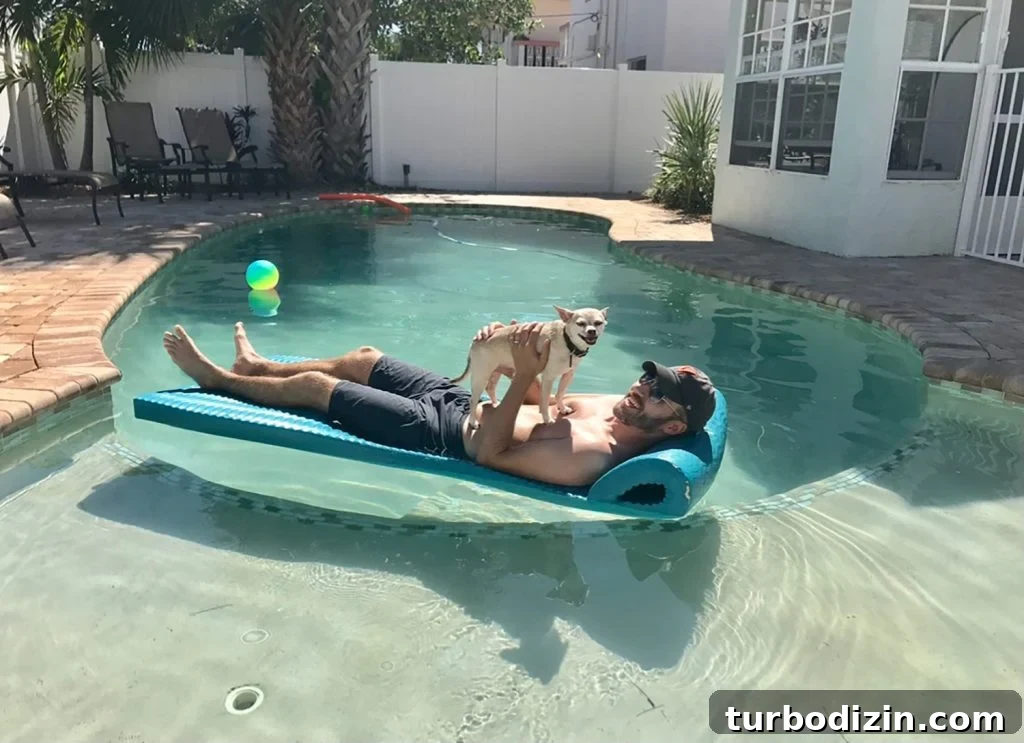 Celebrating the Classic Burger: History, Recipes, and Icons 12 Burger making smiley face while on John's stomach in pool float
