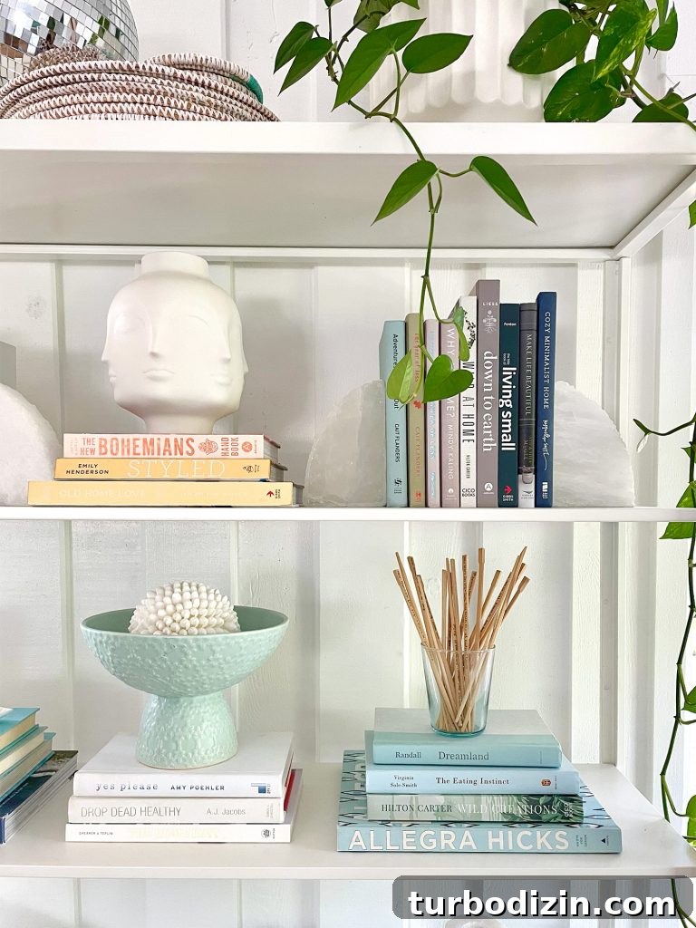 Family Room That Doubles as Office, Art Studio, and Home Theater 20 Detail Of Ikea Fjalkinge Shelf Bookcase With Styled Books And Decorative Objects