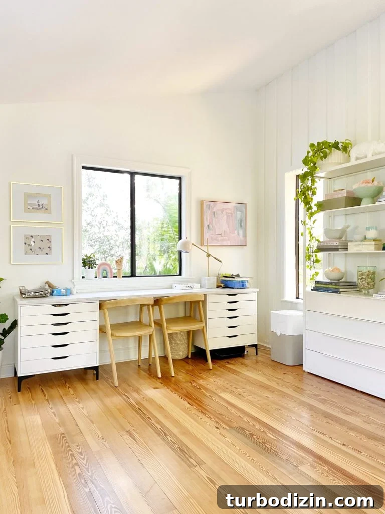 Family Room That Doubles as Office, Art Studio, and Home Theater 25 Kids Art Desk In Upstairs Modern Family Room With Two Chairs And File Storage