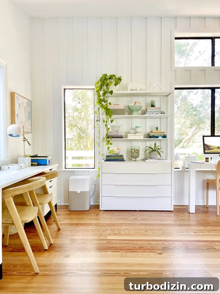 Family Room That Doubles as Office, Art Studio, and Home Theater 4 Ikea Fjalkinge Bookcase In Modern White Family Room With Paneling And Kids Art Desk