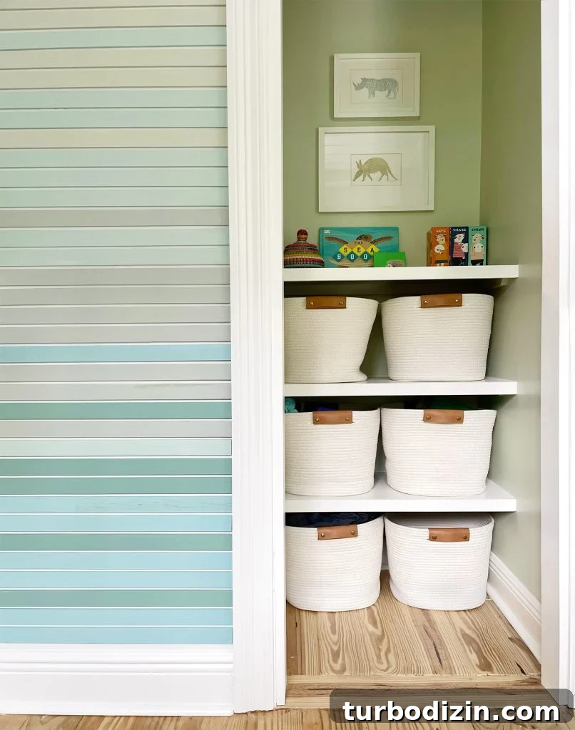 Smart Storage Solutions for a Small Kids' Bedroom 4 Painted Closet With Custom DIY Shelves And Art Hanging Above Them