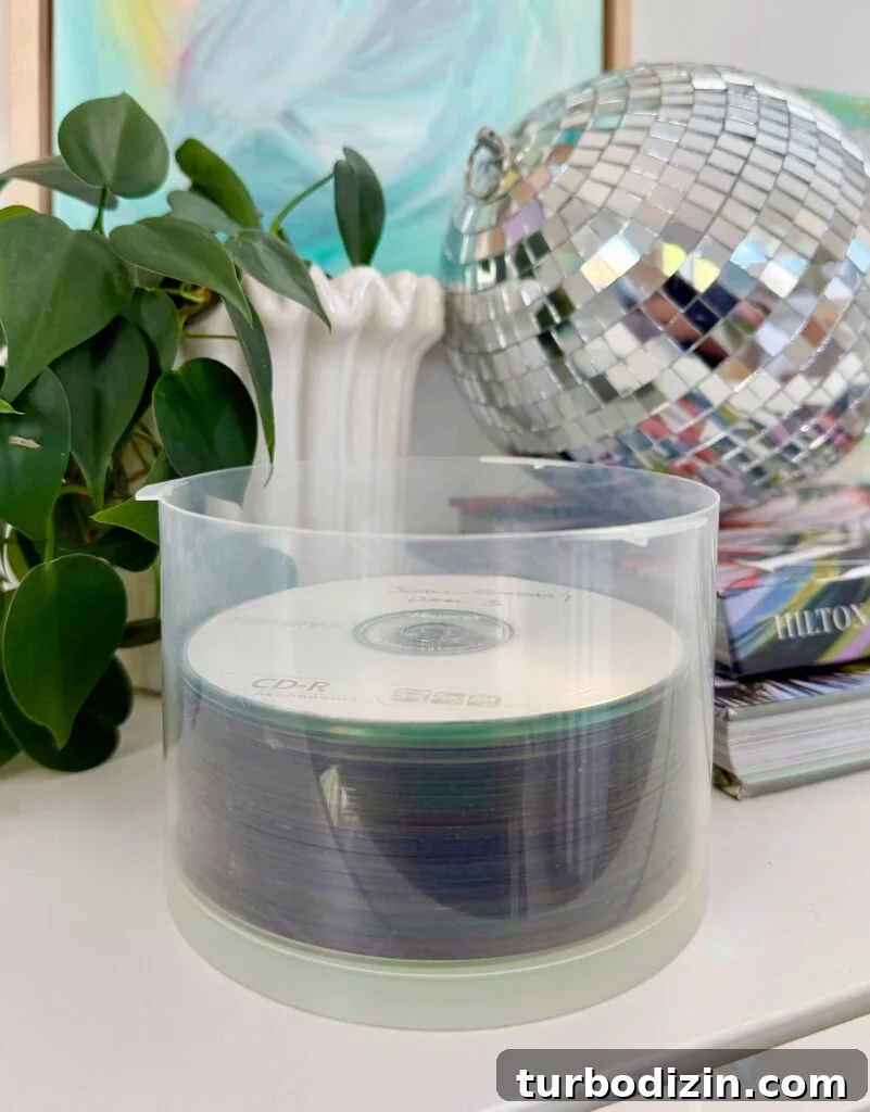 How We Organize Our Digitized Photos for Quick Access 7 Stack of burned CDs containing old photos