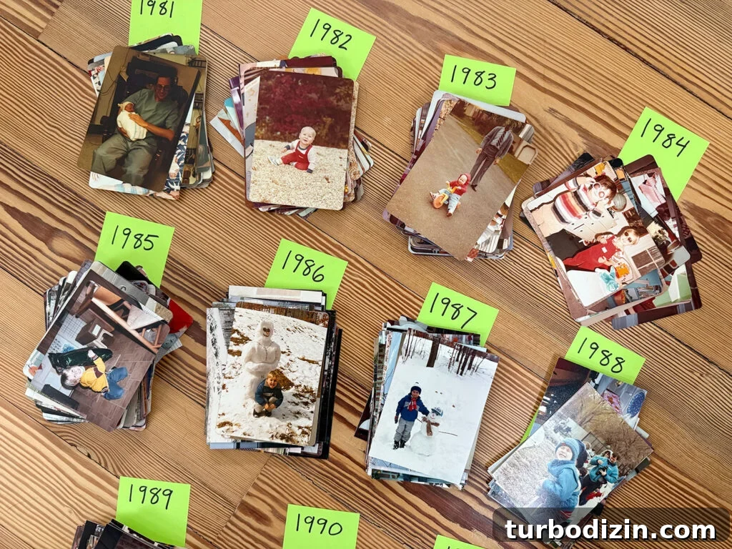 How We Organize Our Digitized Photos for Quick Access 8 Stacks of Old Photos Sorted By Year