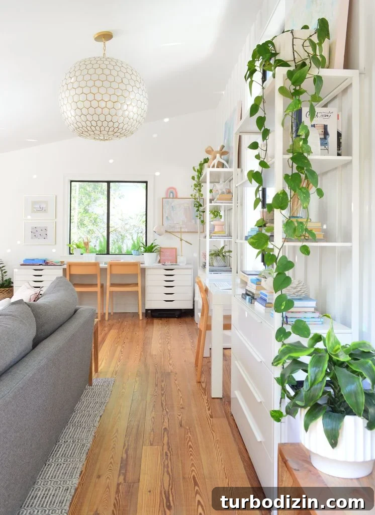 New Flooring FAQ: Answers About Installation, Care and Warranty 11 Upstairs family room with plants and Serena & Lily capiz pendant light