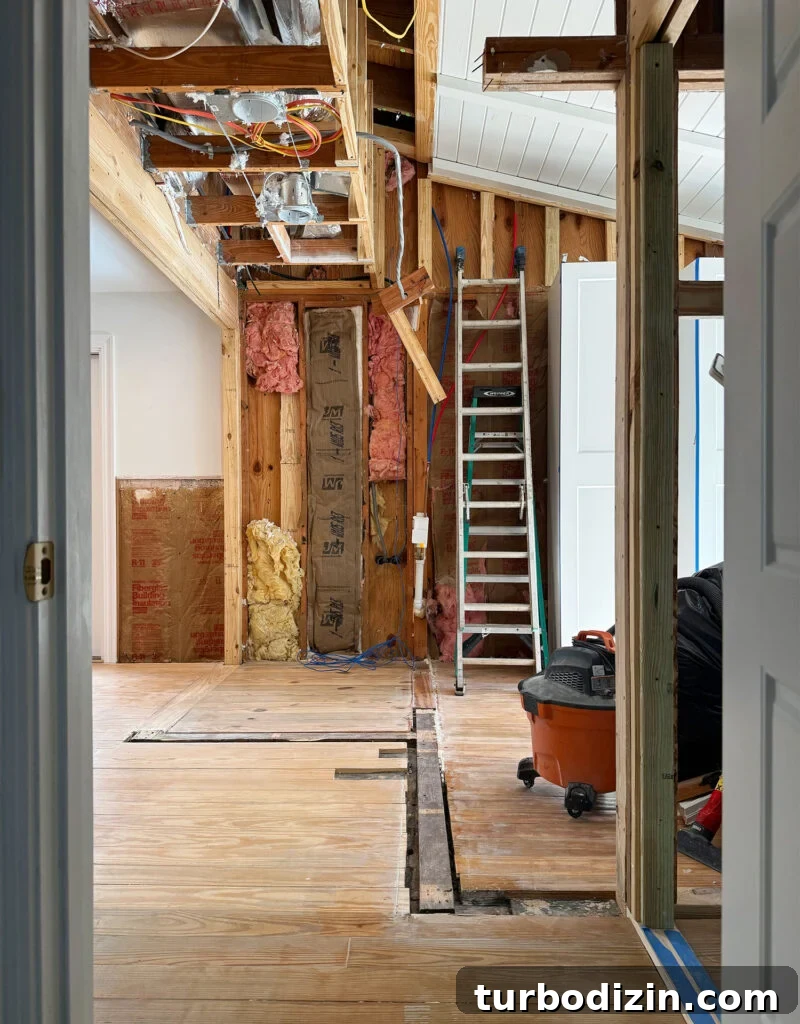 New Flooring FAQ: Answers About Installation, Care and Warranty 4 View From Existing Bathroom To New Living Area